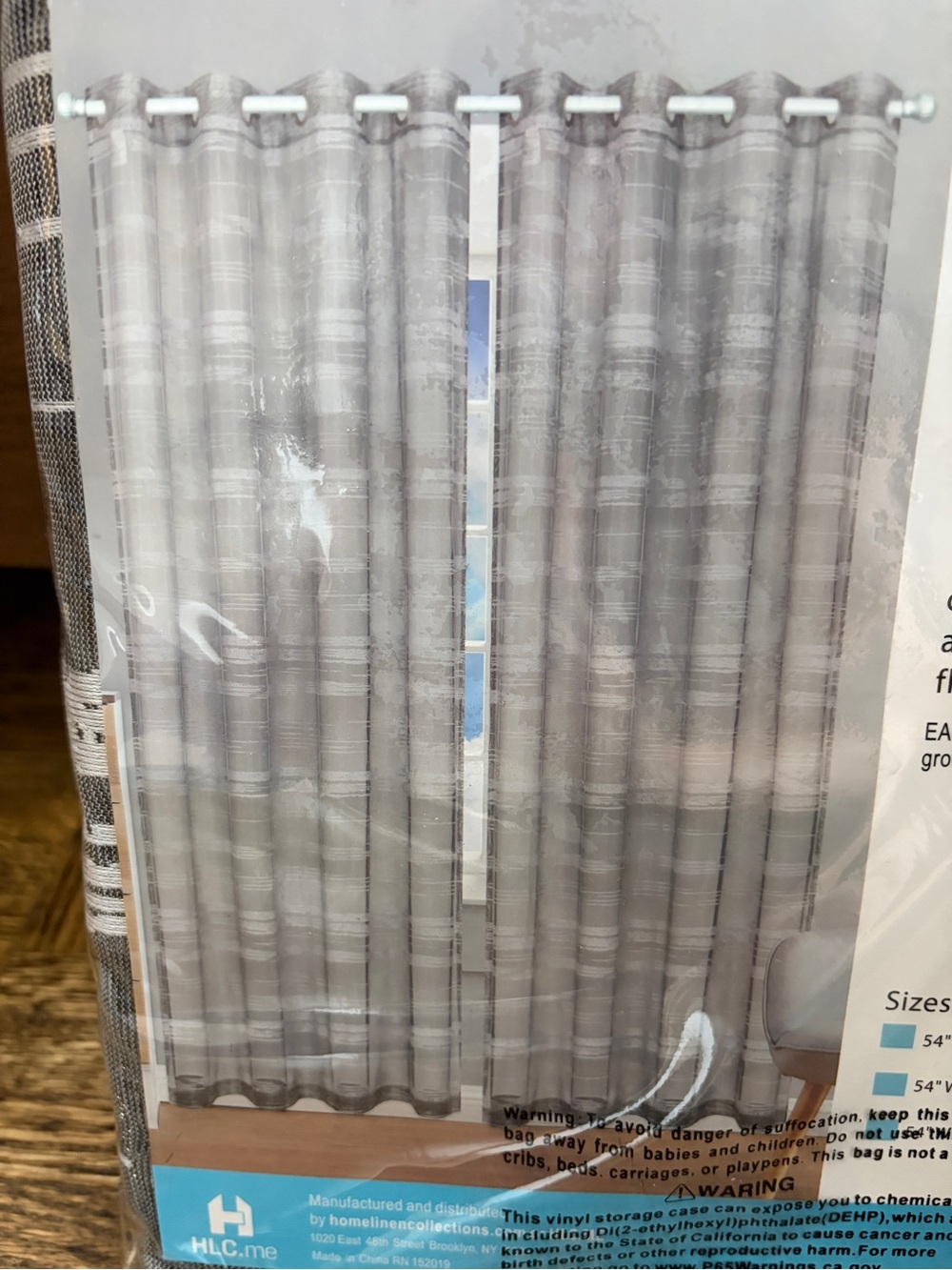 Gray Grommet-Top Curtain Panels - 4 in total. 54 by 84.